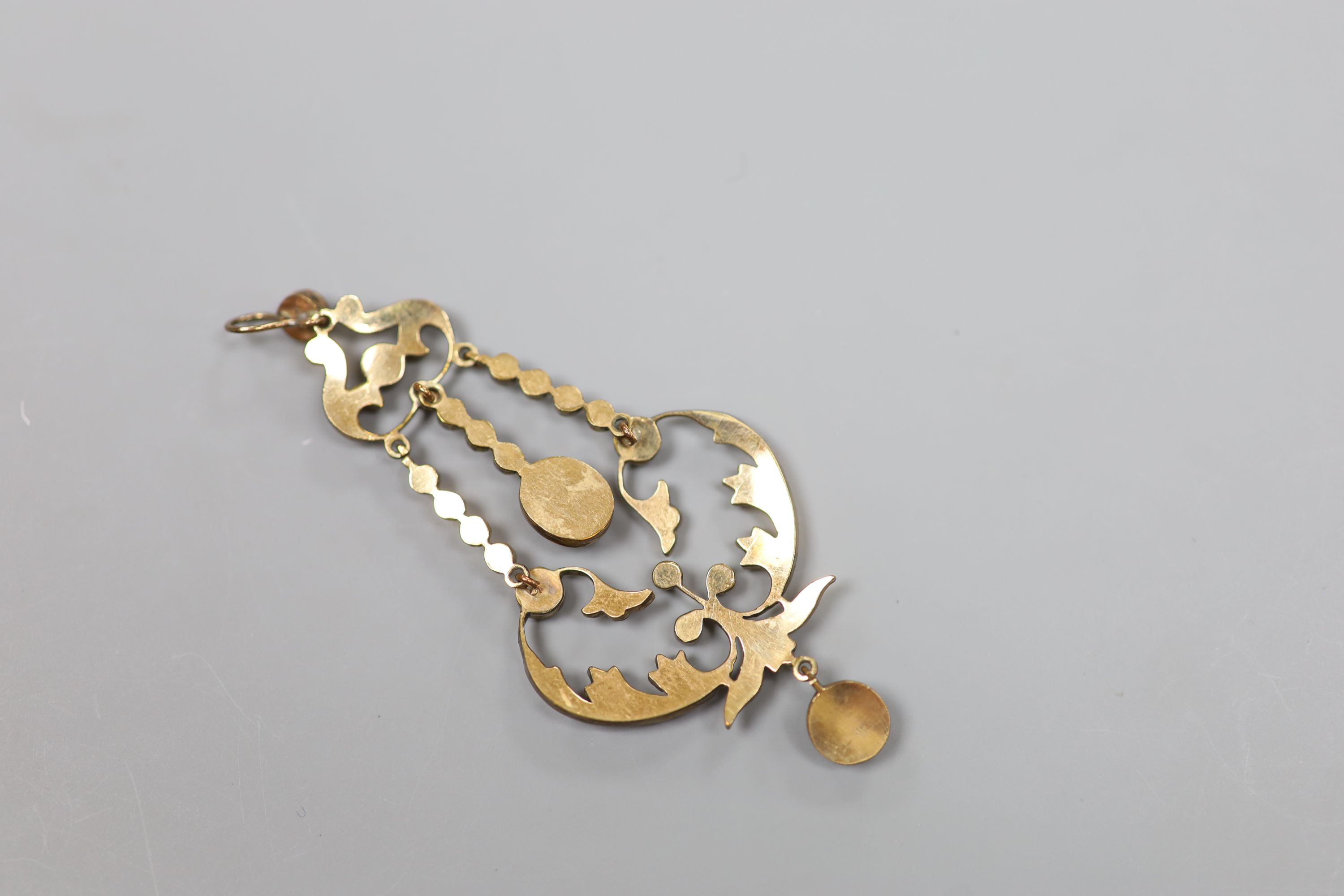 A late Victorian gold plated and facet garnet garnet cluster set drop pendant, overall 75cm, 6.9 grams.